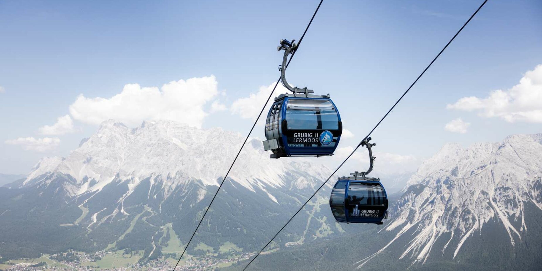 Grubigsteinbahn im Sommer mit der Zugspitze im Hintergrund | © Tiroler Zugspitz Arena/Klemens König