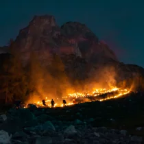 People who light the traditional mountain fires on the mountain | © Tiroler Zugspitz Arena/Bianca McCarty