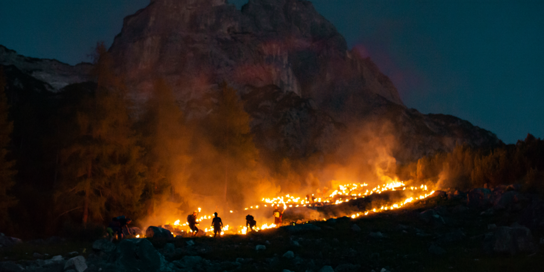 People who light the traditional mountain fires on the mountain | © Tiroler Zugspitz Arena/Bianca McCarty