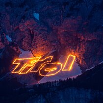 The Tirol lettering, as a mountain fire | © Tiroler Zugspitz Arena/Frozen Lights