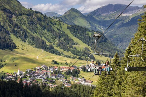 A family in the chairlift | © Werbeagentur Bärig