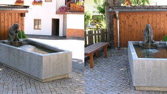 Brunnen mit einem Biber als Wasserspeier.
