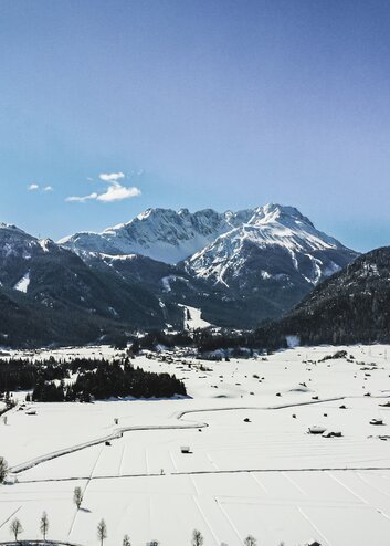 A drone shot of the village of Biberiwer in winter | © Tiroler Zugspitz Arena