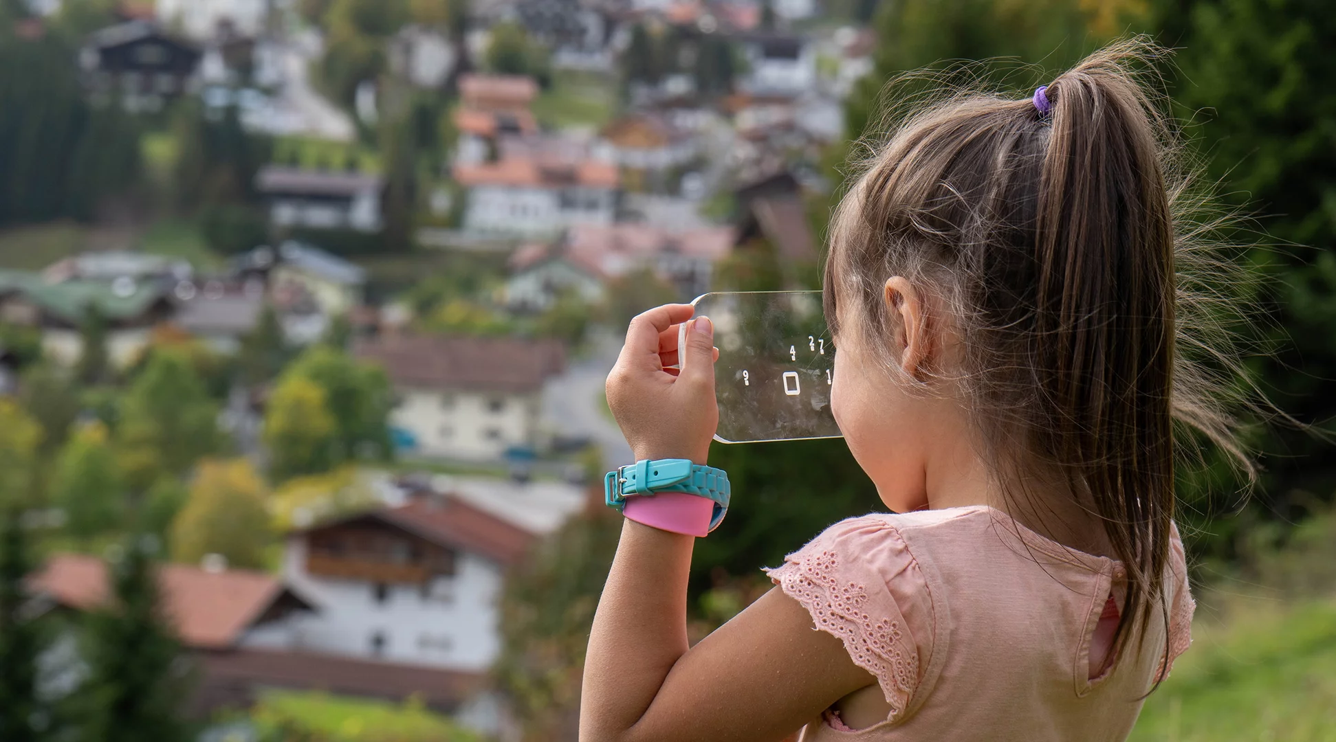 Escape trails A girl looks at a transparent puzzle object