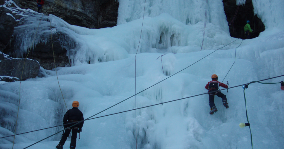 people climbing ih the ice
